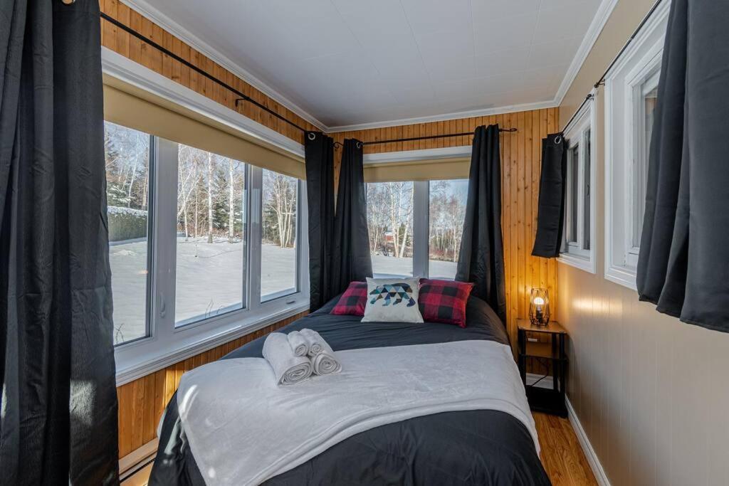 Spa, sauna et foyer : Le Phare de Baie-Saint-Paul Extérieur photo